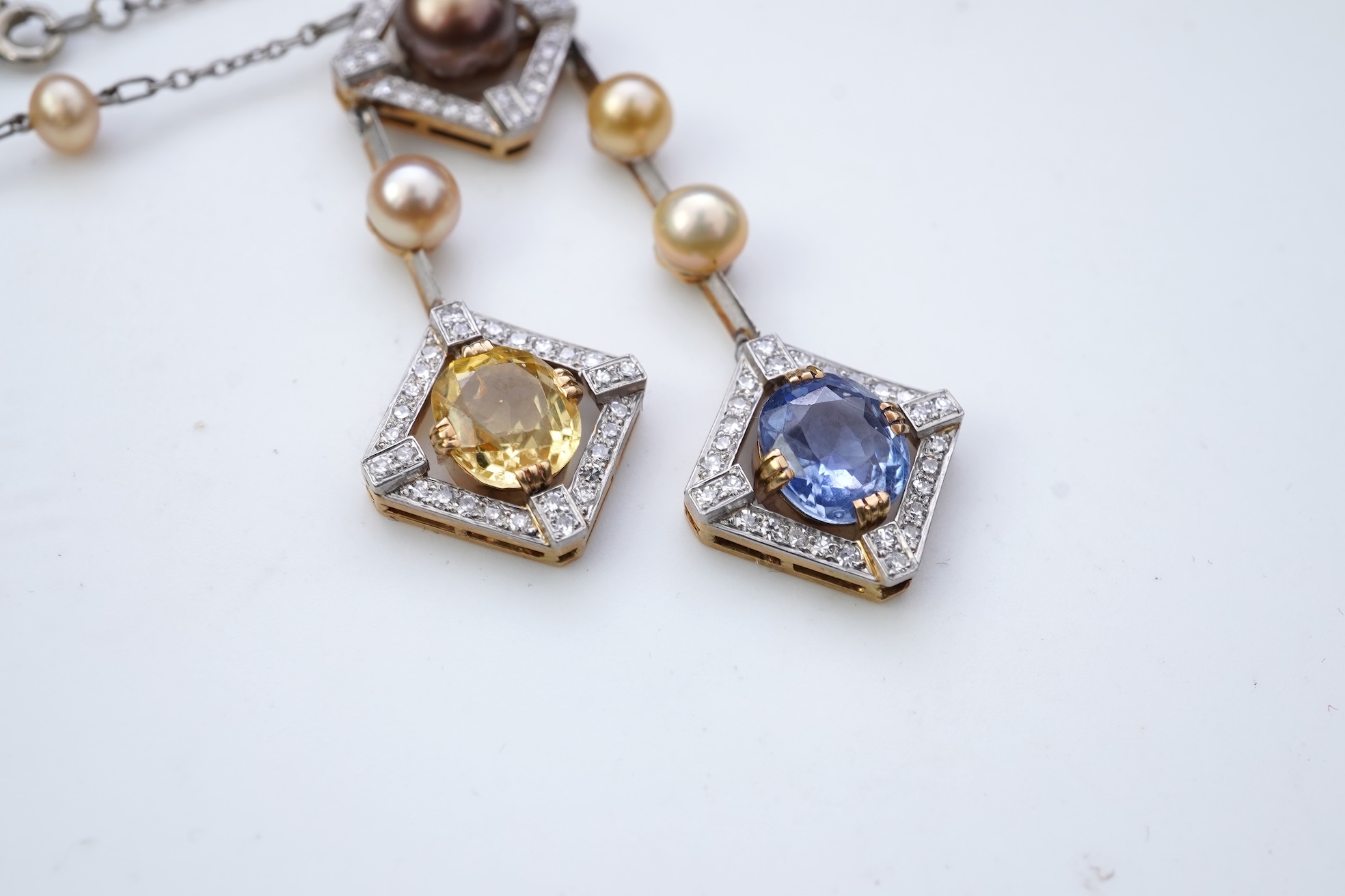 An Art Deco sapphire, natural pearl and diamond necklace, circa 1920